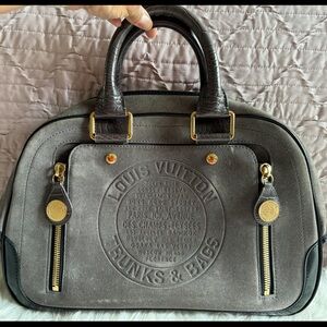 Louis Vuitton with Certificate of Authenticity.